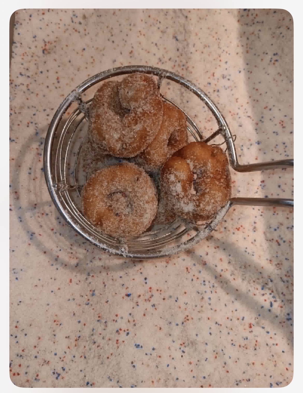Mini apple cider donuts fresh from the pie shop fryer